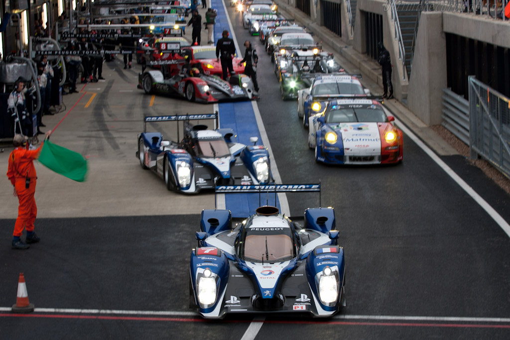 Exiting the pit lane   - 2011 Le Mans Series 6 Hours of Silverstone (ILMC)
